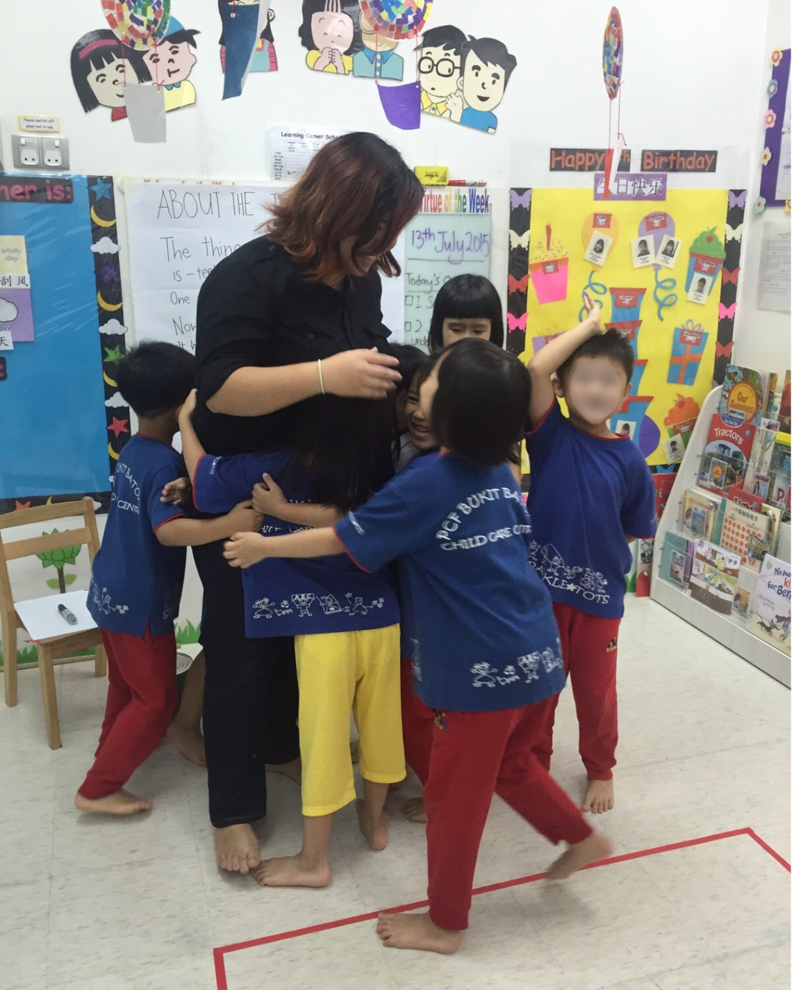 Carmen with kids in classroom