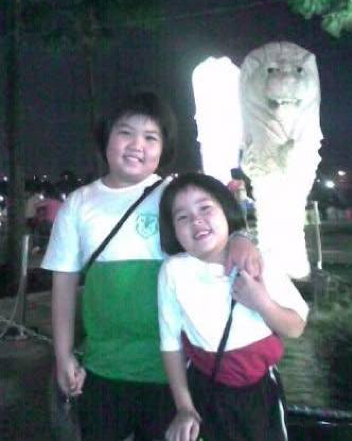 Carmen and sister in P3 PE uniform